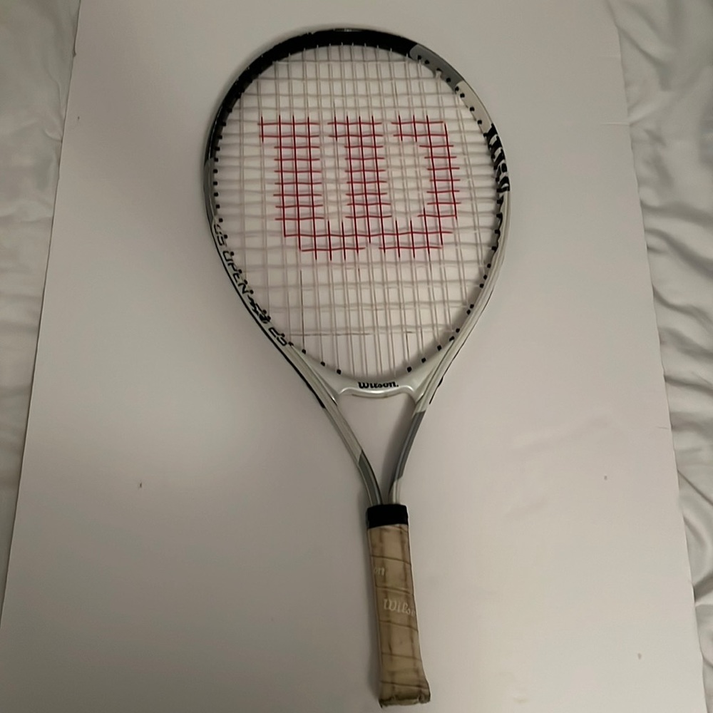 - Wilson tennis racquet